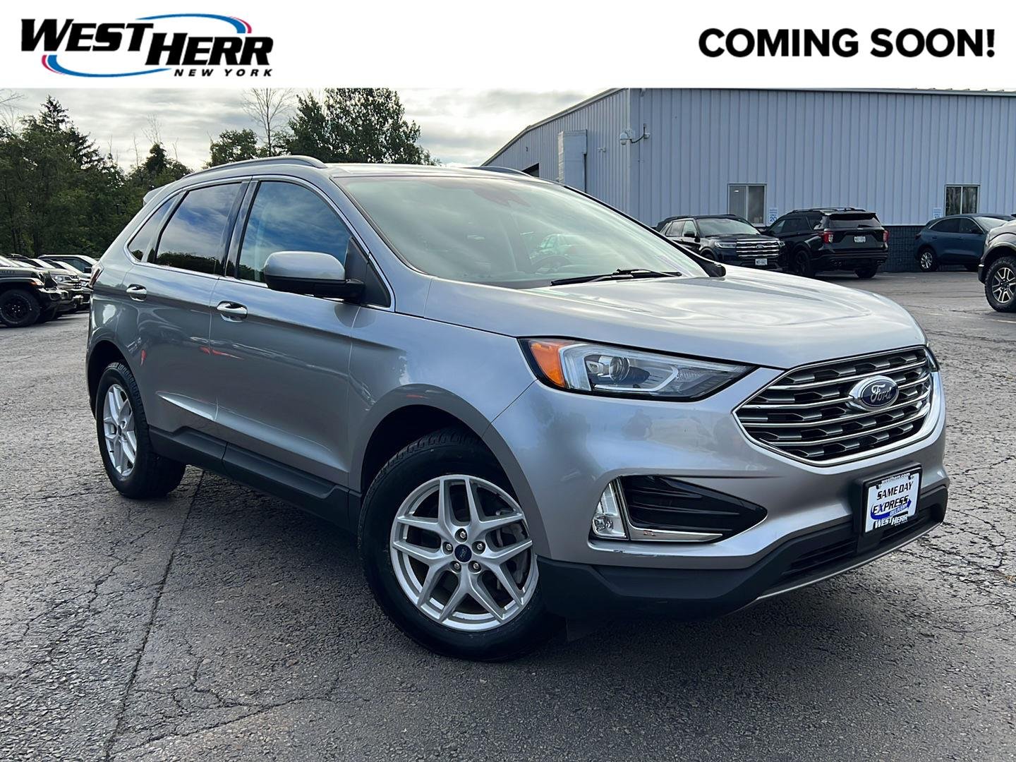 Used 2021 Iconic Silver Ford SEL image 1