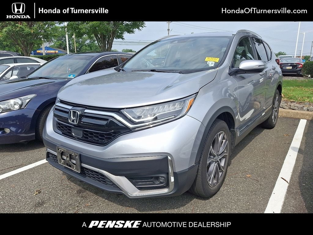 Certified Used 2022 Lunar Silver Metallic Honda Touring image 1