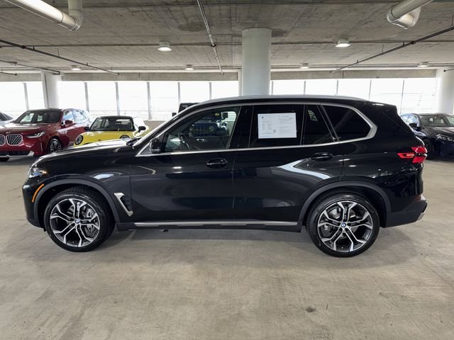 Certified Used 2026 Black Sapphire Metallic BMW sDrive40i image 5