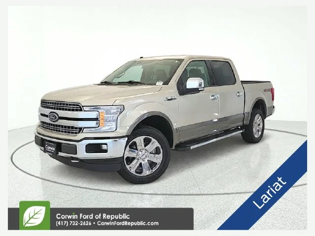 Used 2018 White Gold Ford Lariat image 1
