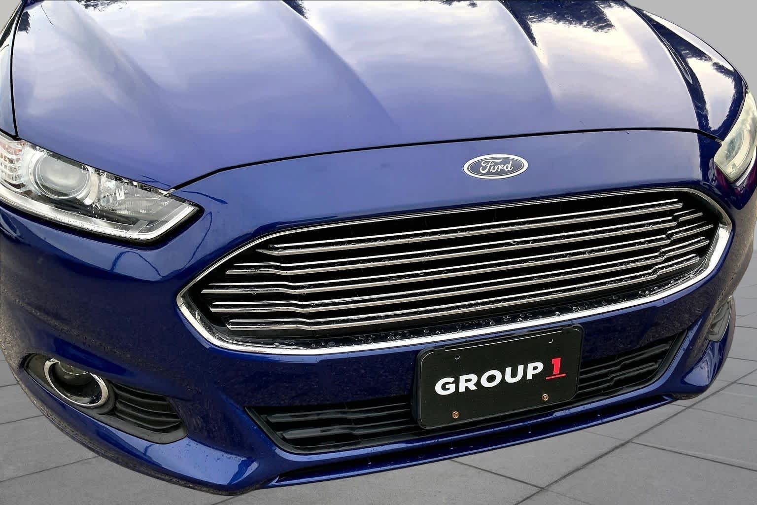 Used 2013 Deep Impact Blue Ford SE image 32