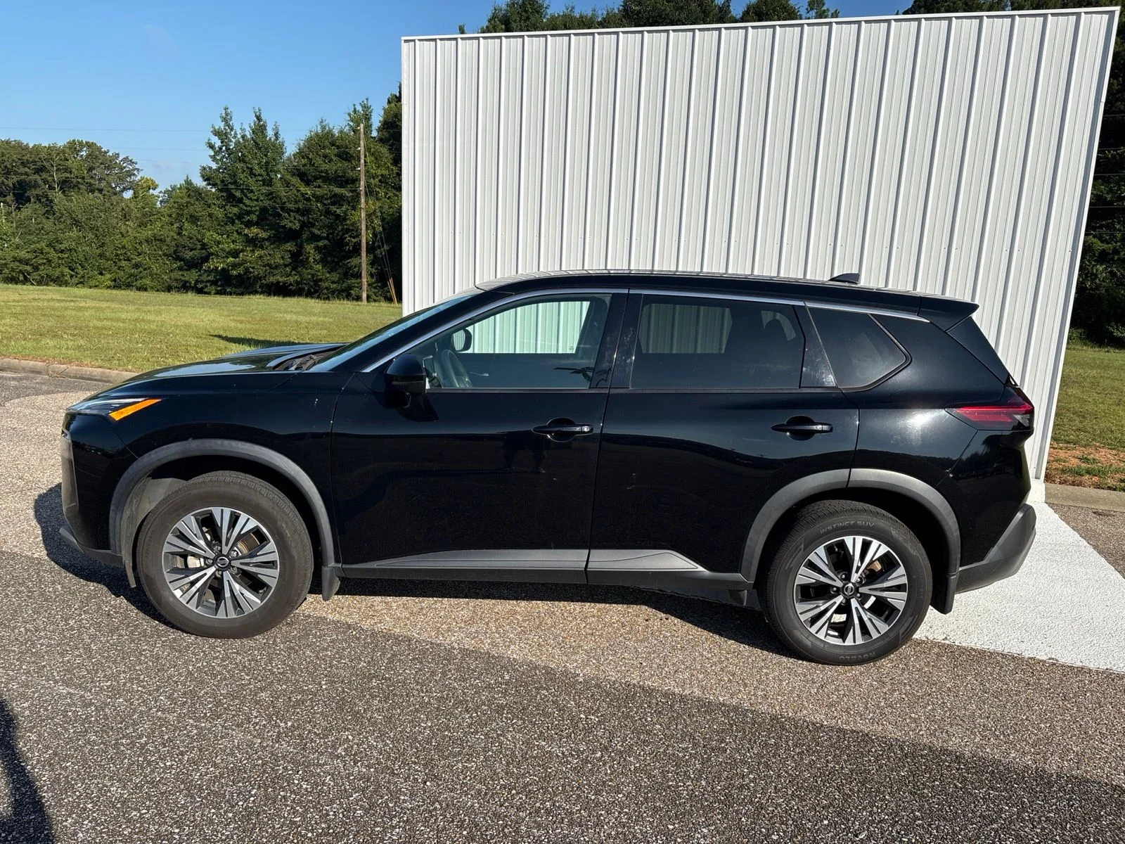 Used 2021 Black Nissan SV image 1