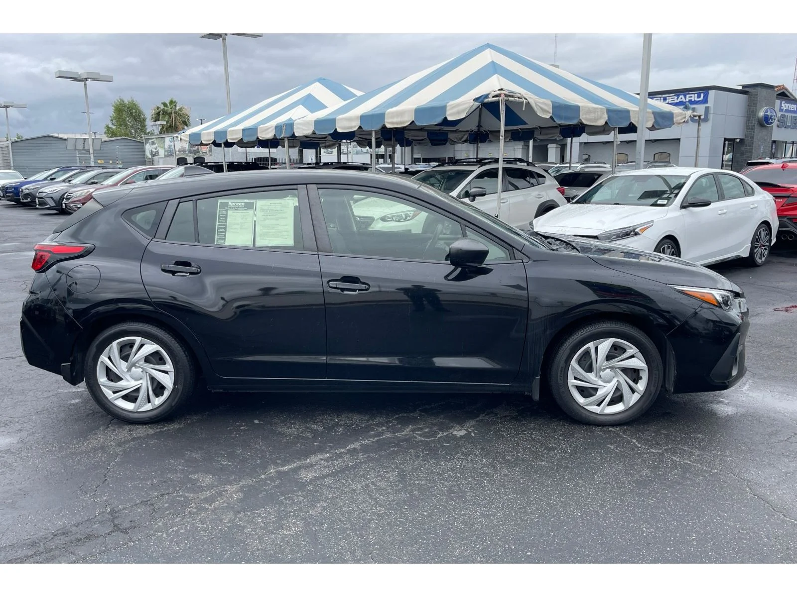 Used 2024 CRYSTAL BLACK SIL Subaru Base image 7