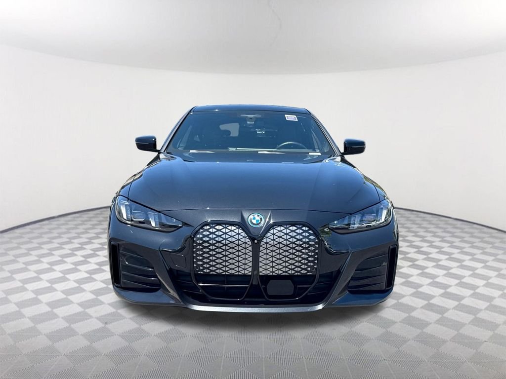 Used 2025 Black Sapphire Metallic BMW eDrive40 image 2