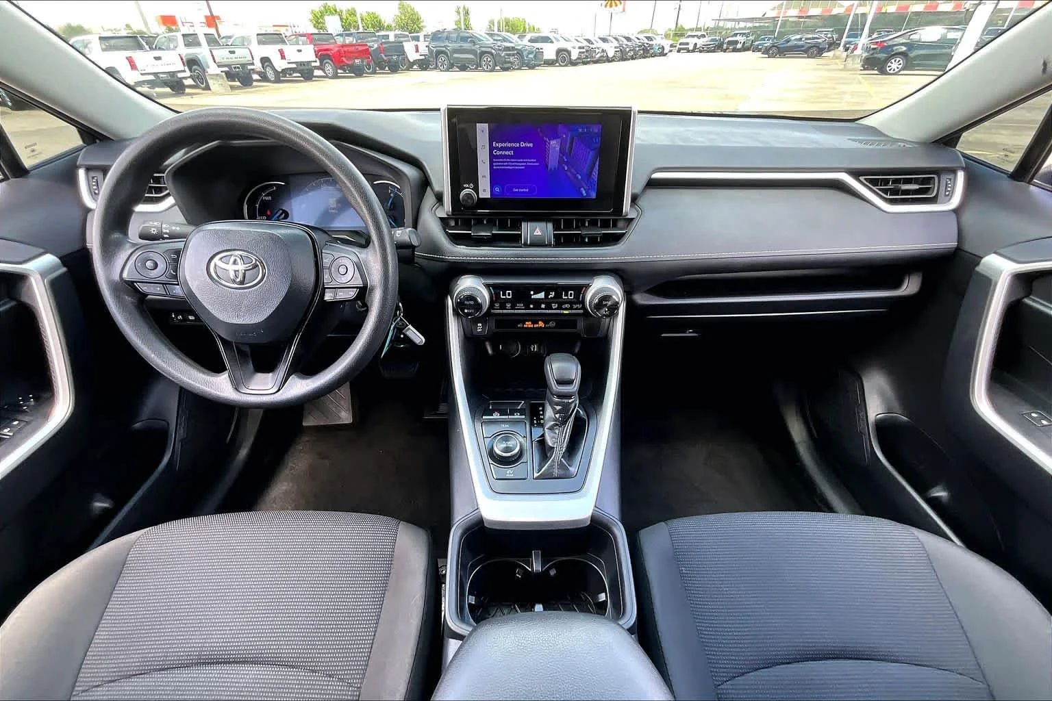 Used 2024 Midnight Black Metallic Toyota Hybrid LE image 15