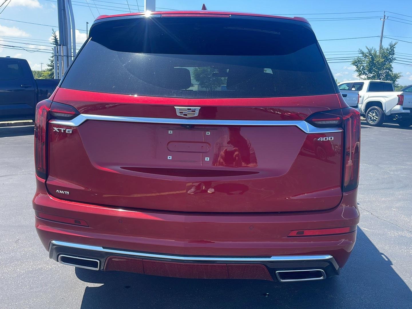 Used 2024 Radiant Red Tintcoat Cadillac AWD Premium Luxury image 6