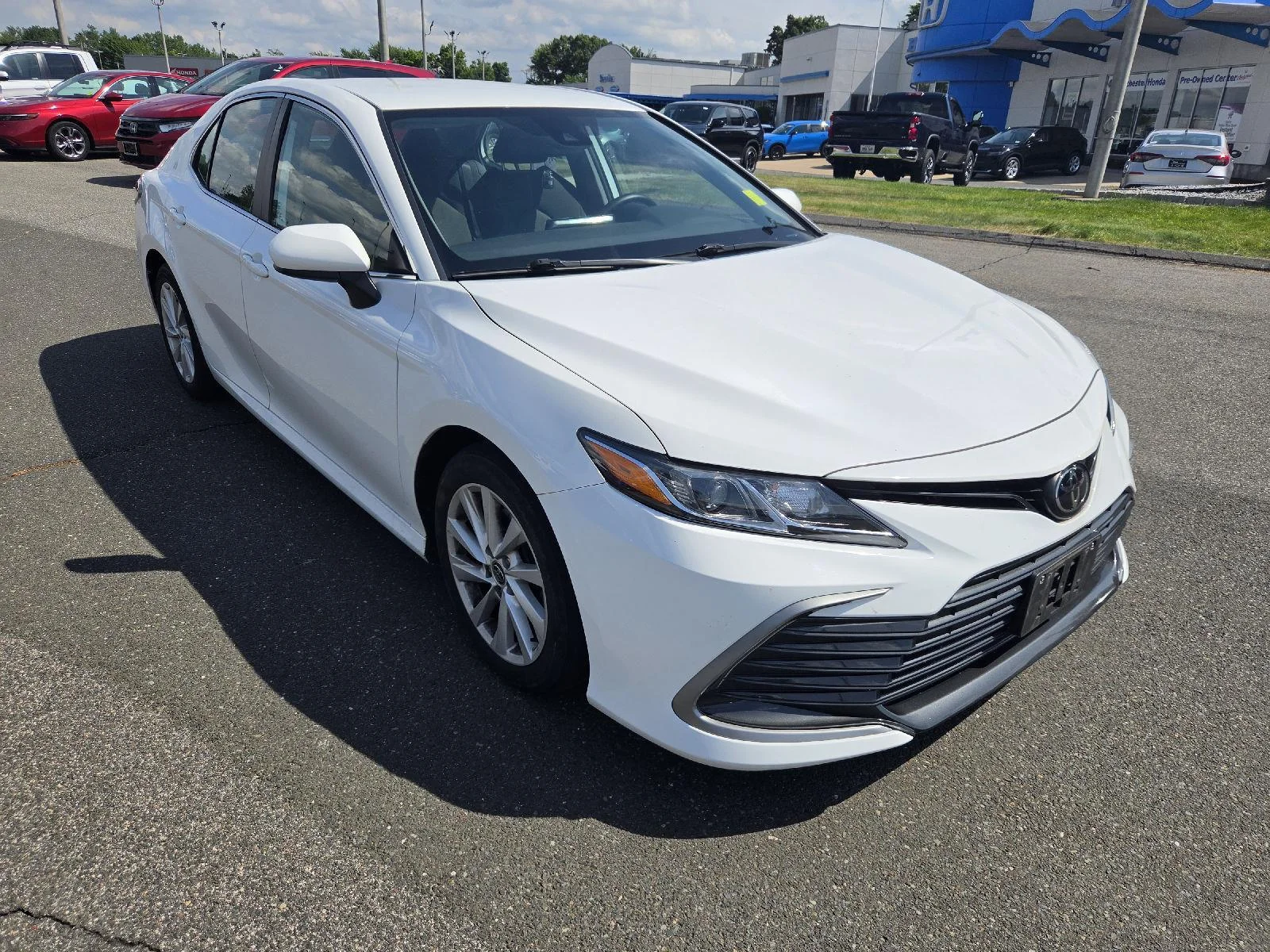 Used 2022 Super White Toyota LE image 1