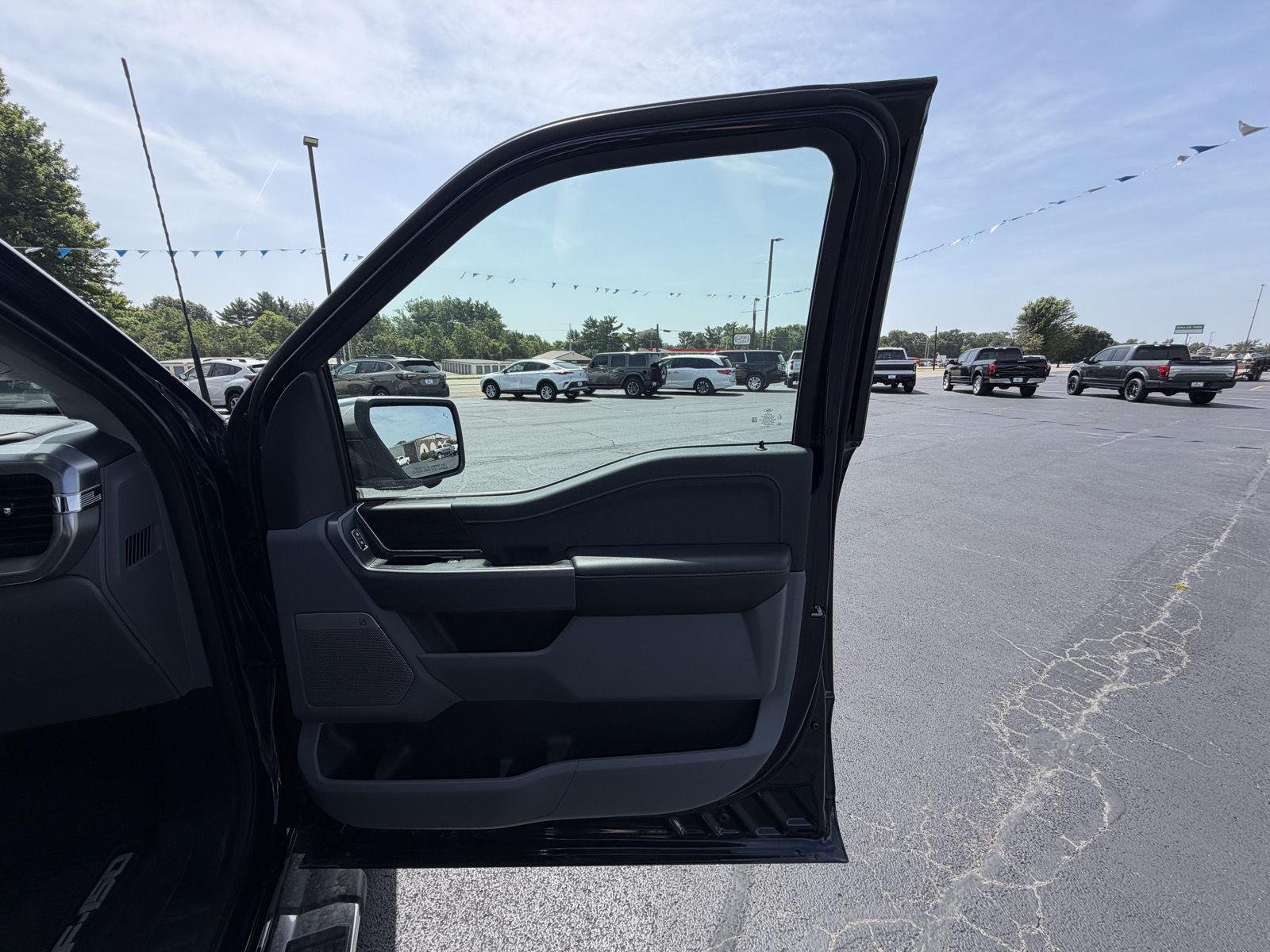 Used 2025 Antimatter Blue Metallic Ford LARIAT image 14
