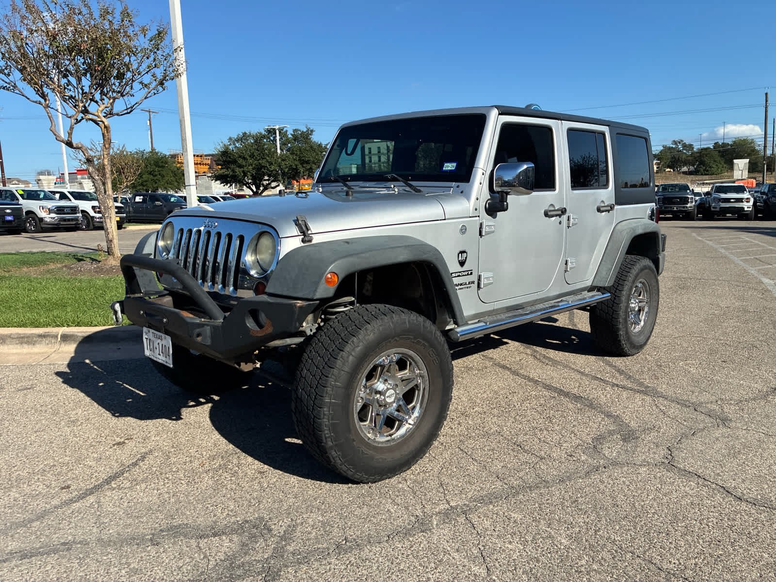 Used 2012 Bright Silver Metallic Jeep Sport image 2