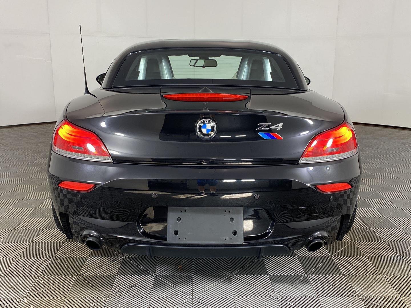 Used 2011 Black Sapphire Metallic BMW sDrive35is image 6