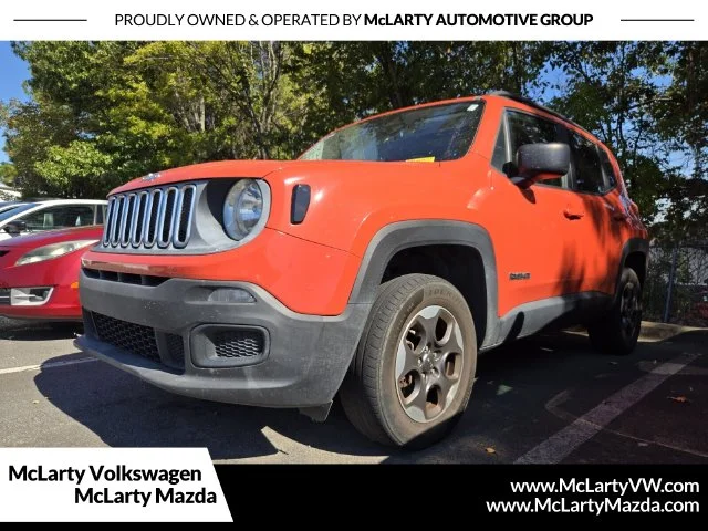 Used 2017 Orange Jeep Sport image 1