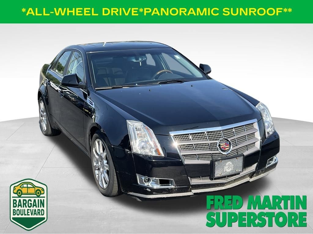 Used 2009 Black Raven Cadillac  image 1