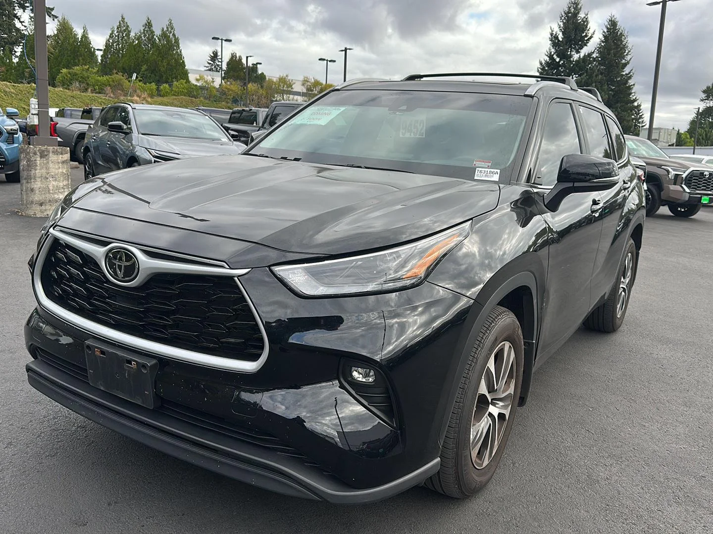 Used 2023 Midnight Black Metallic Toyota XLE image 1