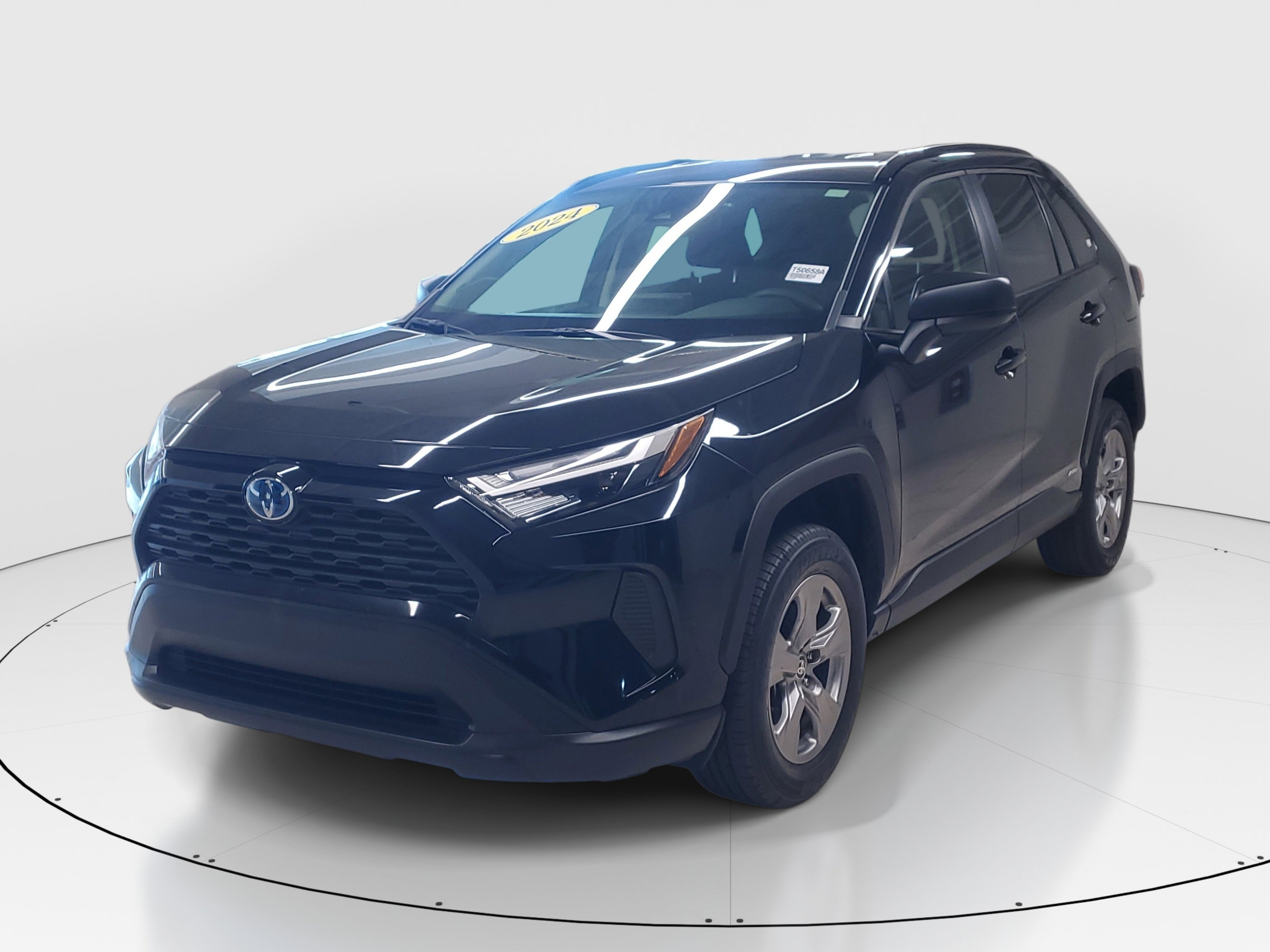 Used 2024 Midnight Black Metallic Toyota Hybrid LE image 3