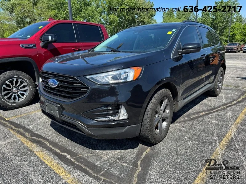 Used 2022 Agate Black Metallic Ford SEL AWD image 1
