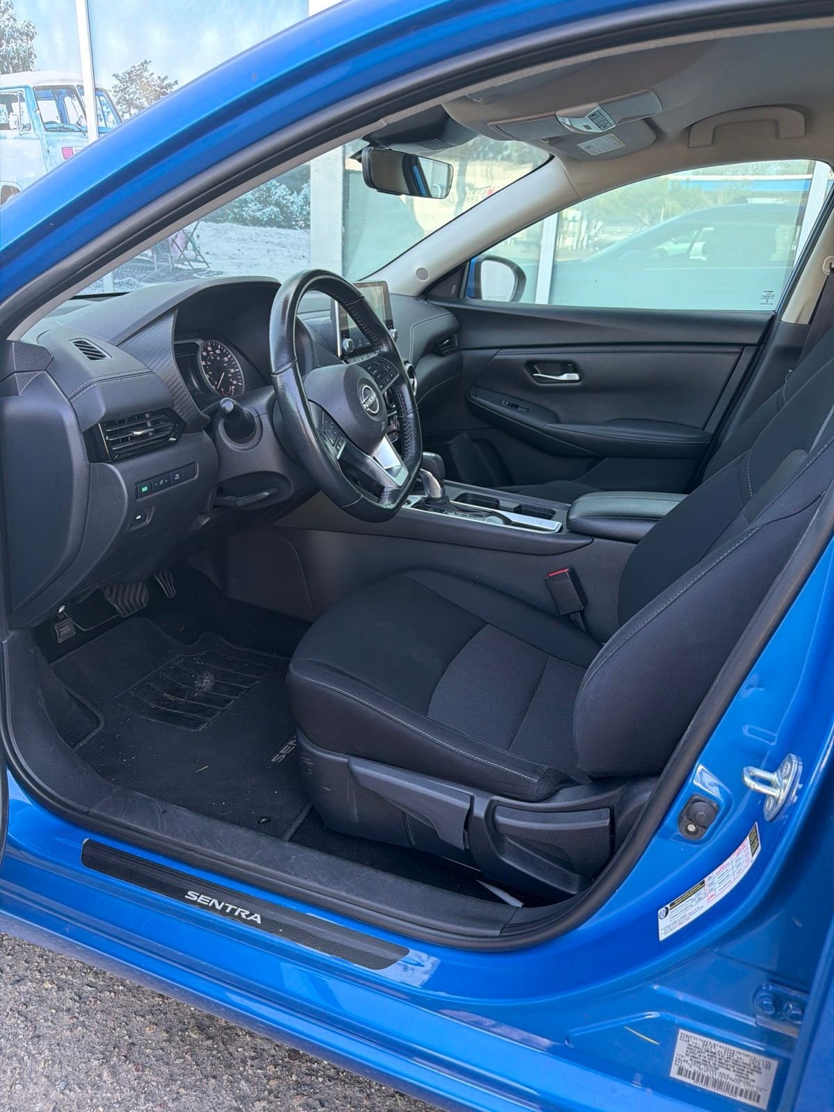 Used 2024 Electric Blue Metallic Nissan SV image 3