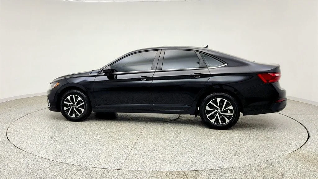 Used 2025 Deep Black Pearl Volkswagen S Automatic w/ Auto-Dimming Mirror image 8