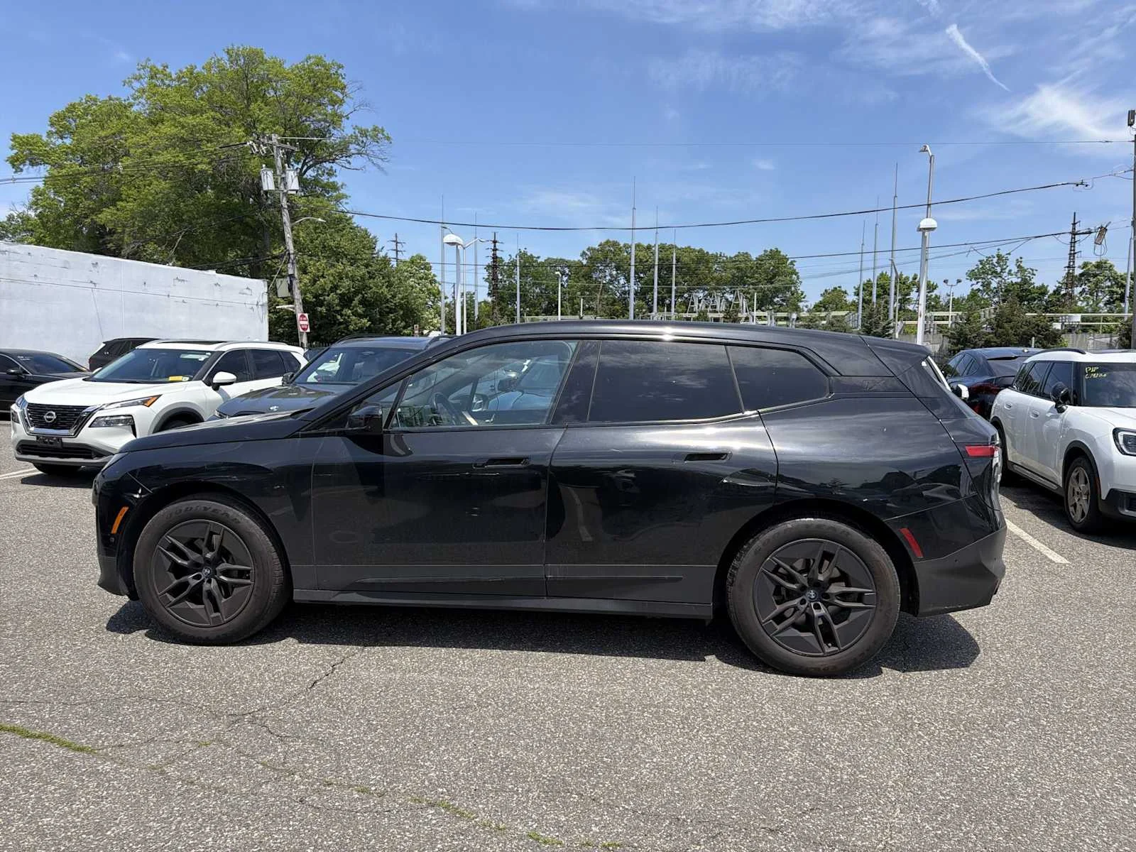 Used 2024 Black Sapphire Metallic BMW xDrive50 image 4