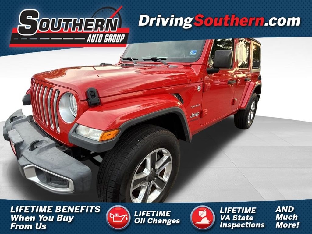 Used 2018 Red Jeep Unlimited Sahara image 1
