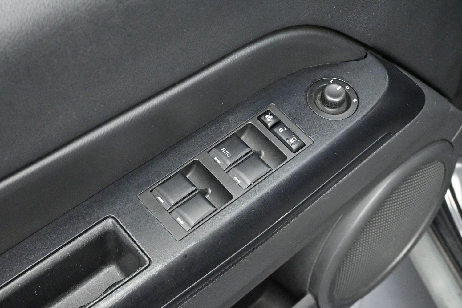 Used 2011 Brilliant Black Crystal Pearl Jeep Sport image 10