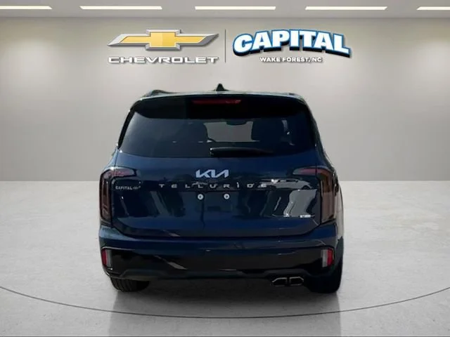 Used 2024 Blue Kia EX X-Line image 4