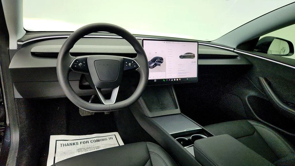 Used 2025 Stealth Grey Tesla Long Range AWD image 12
