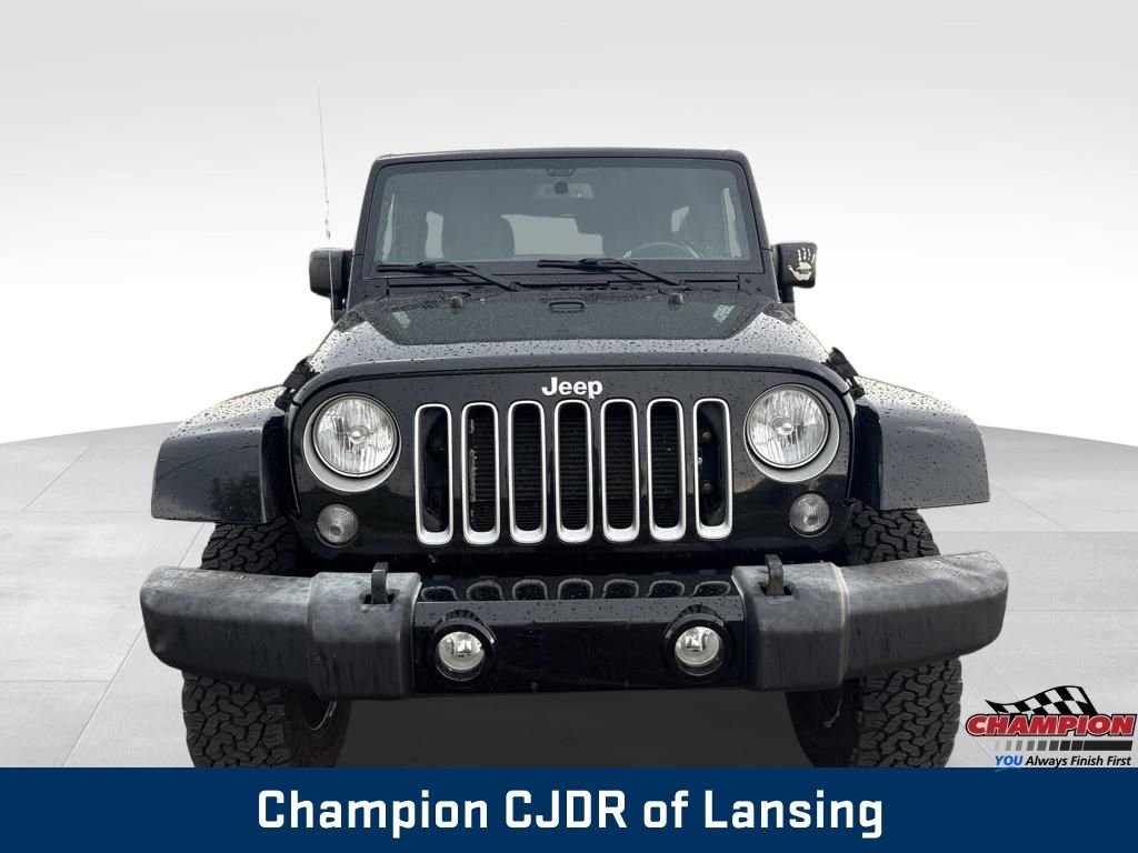 Used 2016 Black Jeep Unlimited Sahara image 10