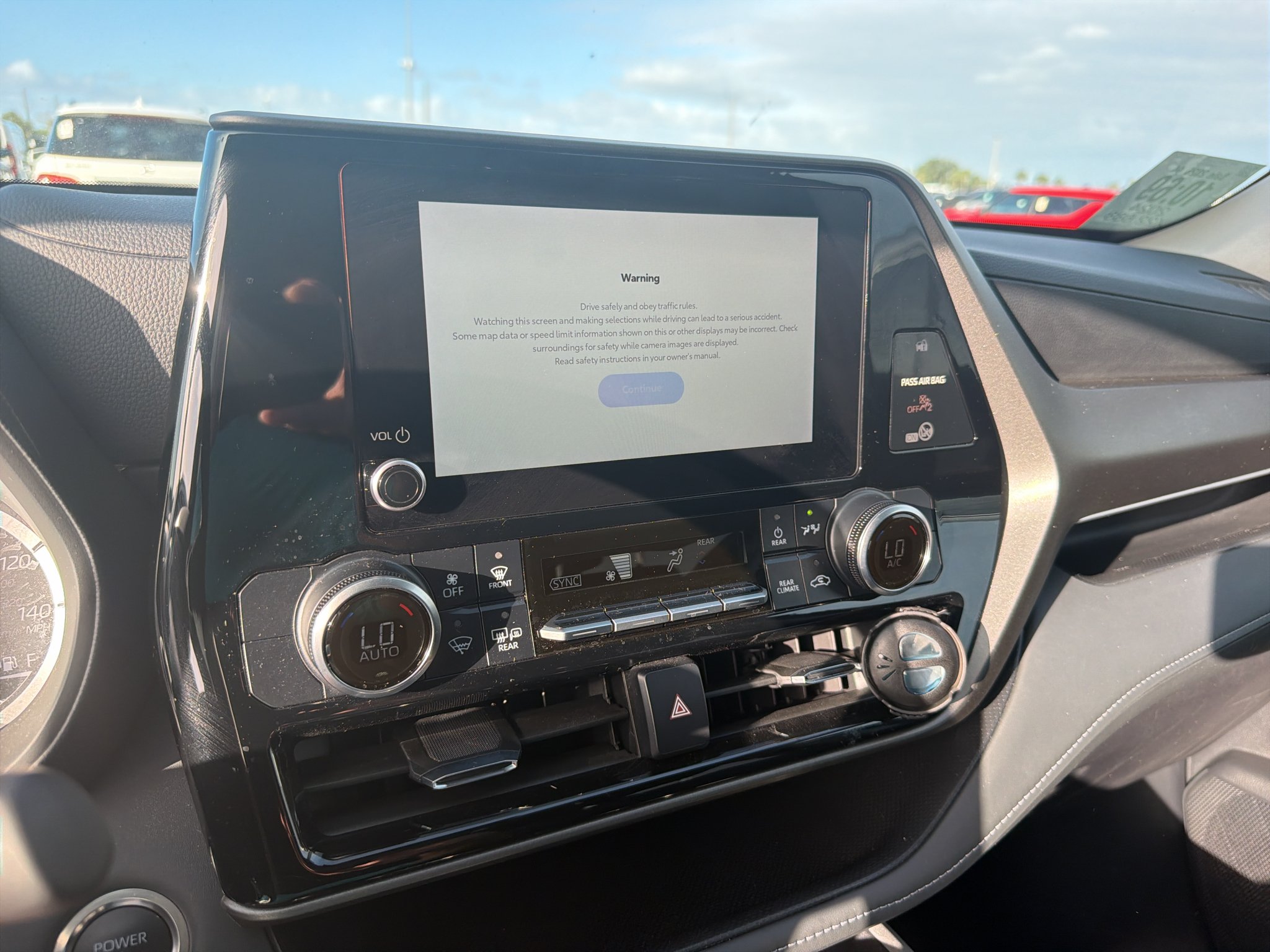 Used 2024 Celestial Silver Metallic Toyota Hybrid LE image 6