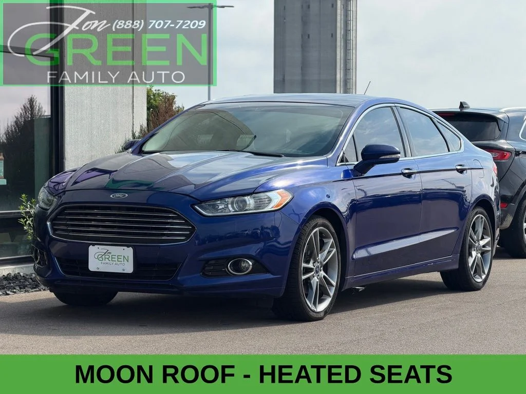 Used 2016 Blue Ford Titanium image 1