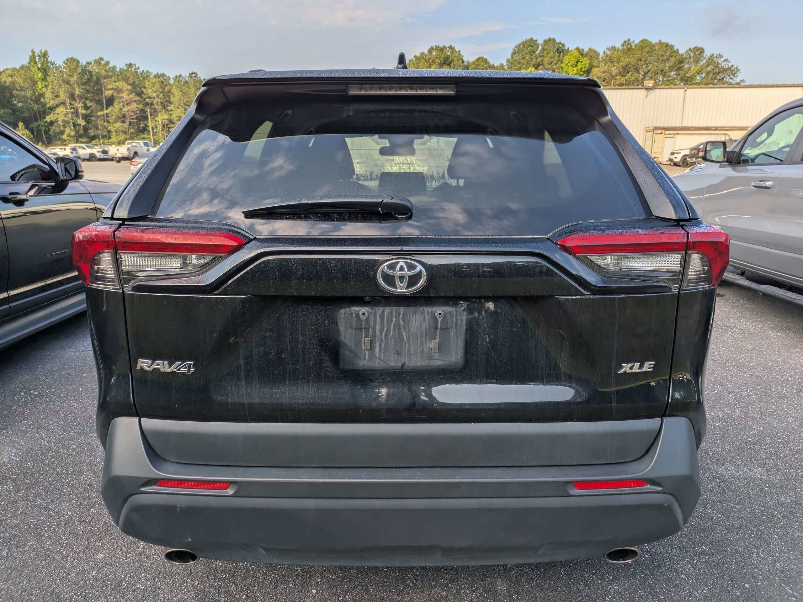 Used 2024 Midnight Black Metallic Toyota XLE image 4