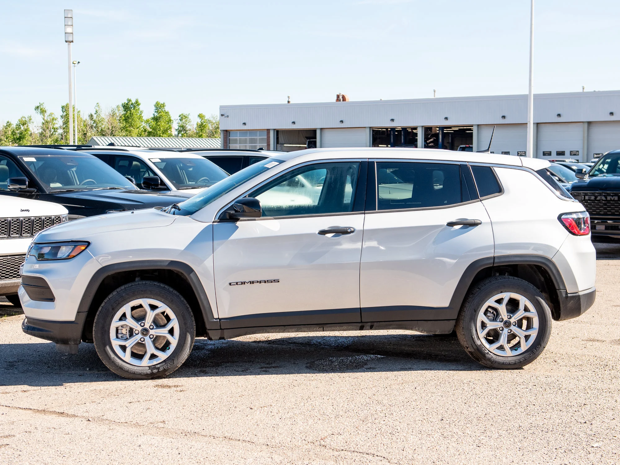New 2026 Silver Jeep Sport* image 2
