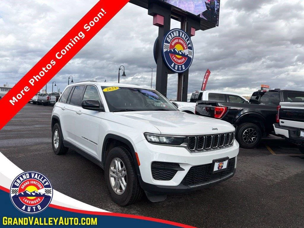 Used 2023 Bright White Clearcoat Jeep Laredo image 1