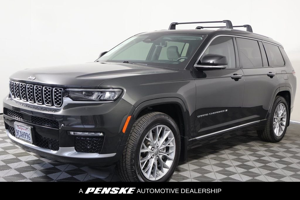 Used 2022 Rocky Mountain Pearlcoat Jeep Summit image 1
