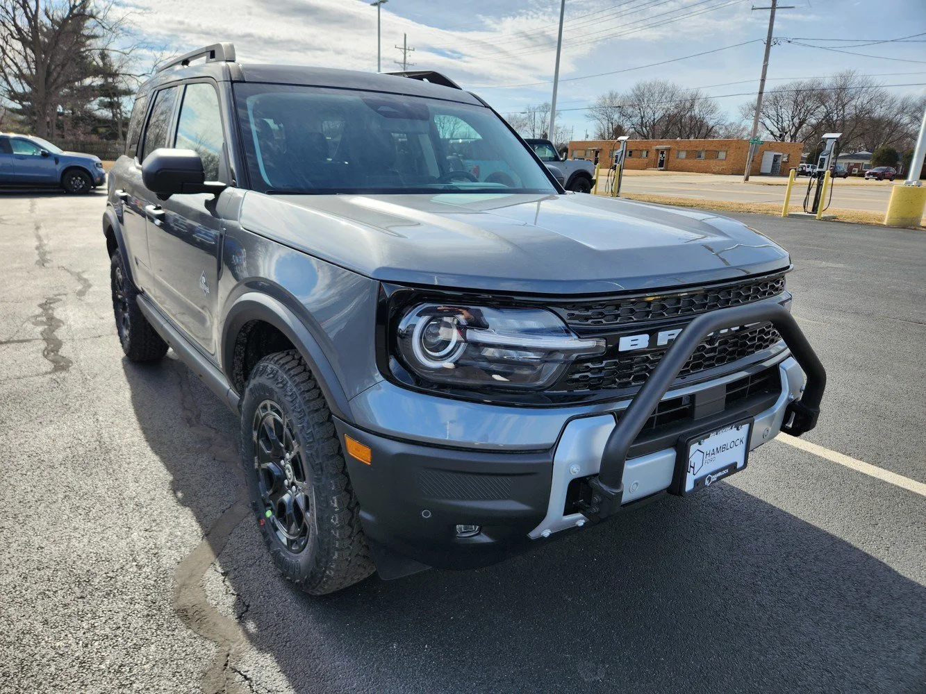 New 2026 Carbonized Gray Metallic Ford Outer Banks image 1