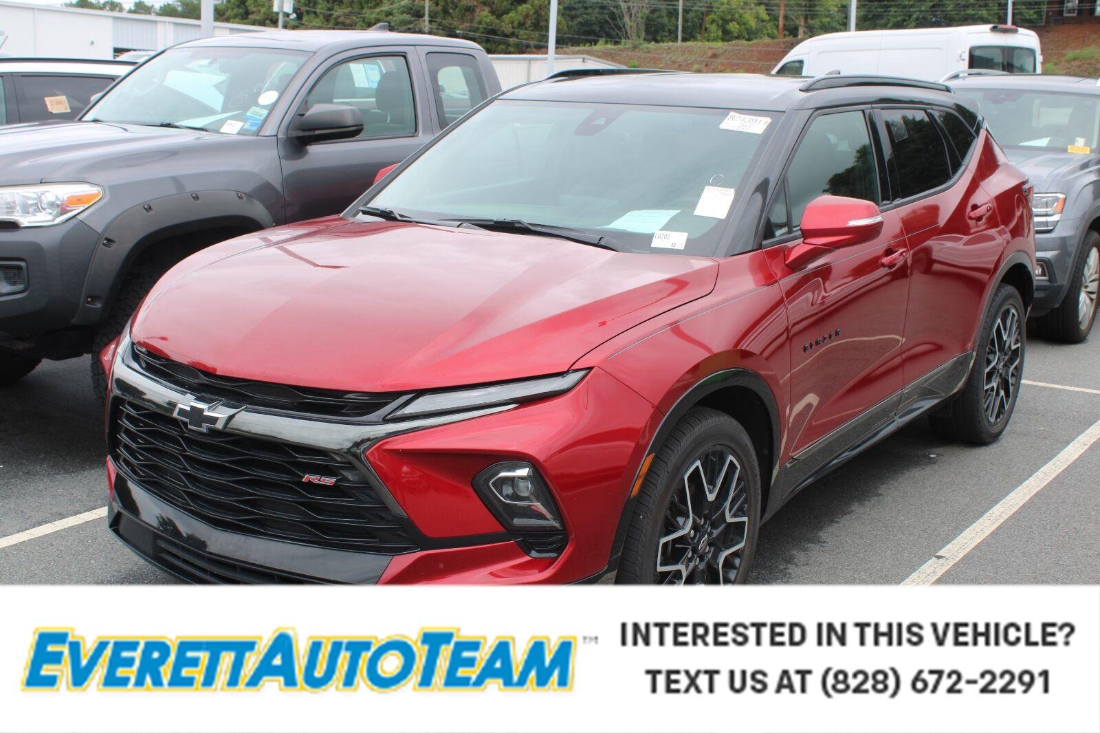 Used 2024 Radiant Red Tintcoat Chevrolet RS image 1