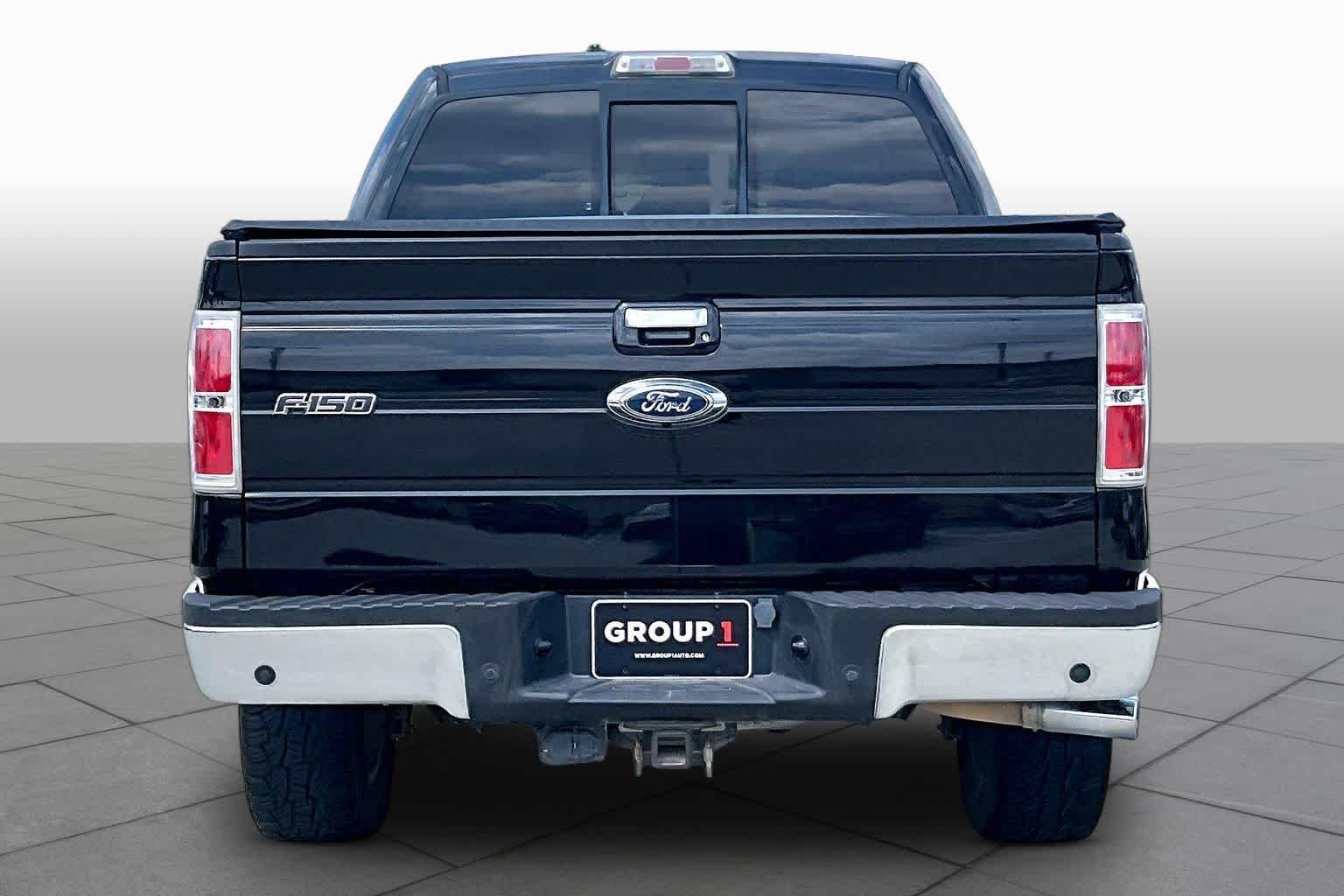 Used 2013 Tuxedo Black Metallic Ford Lariat image 4