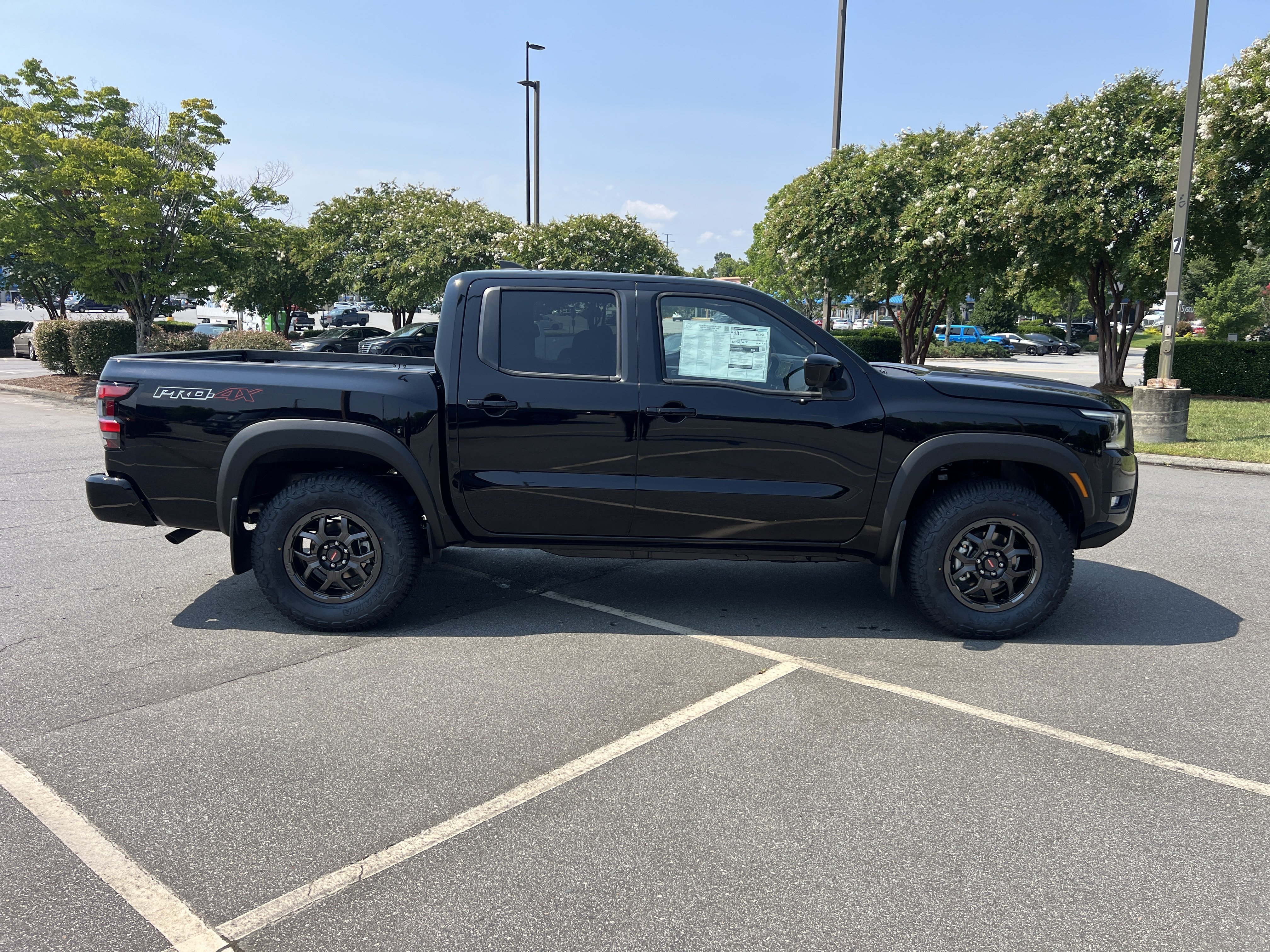 New 2026 Super Black Nissan Crew Cab PRO-4X® image 4
