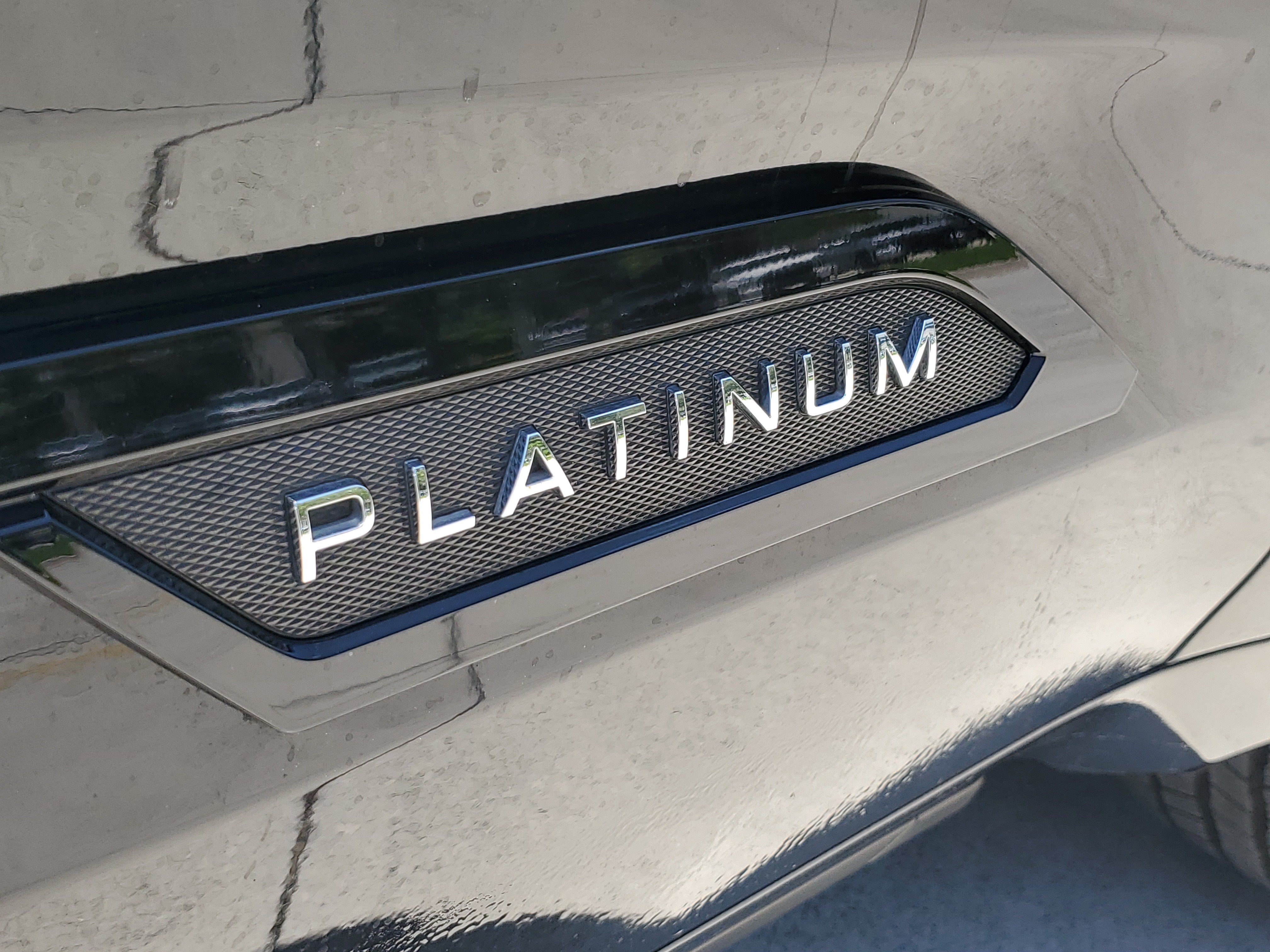 Used 2024 Midnight Black Metallic Toyota Platinum Hybrid image 8