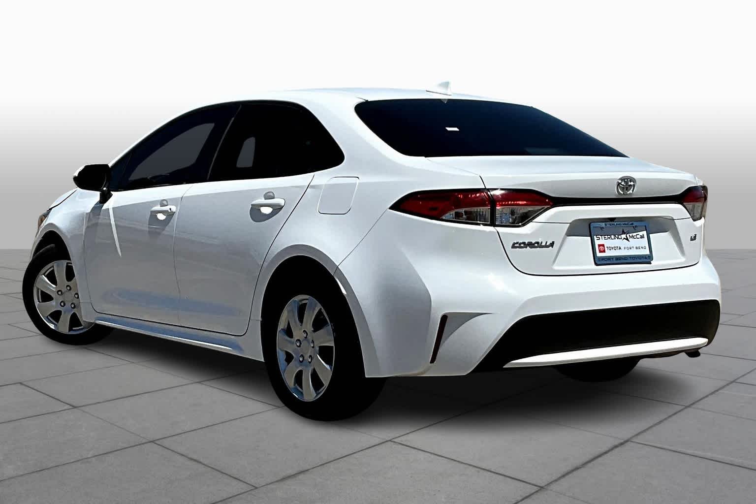 Used 2021 Super White Toyota LE image 12