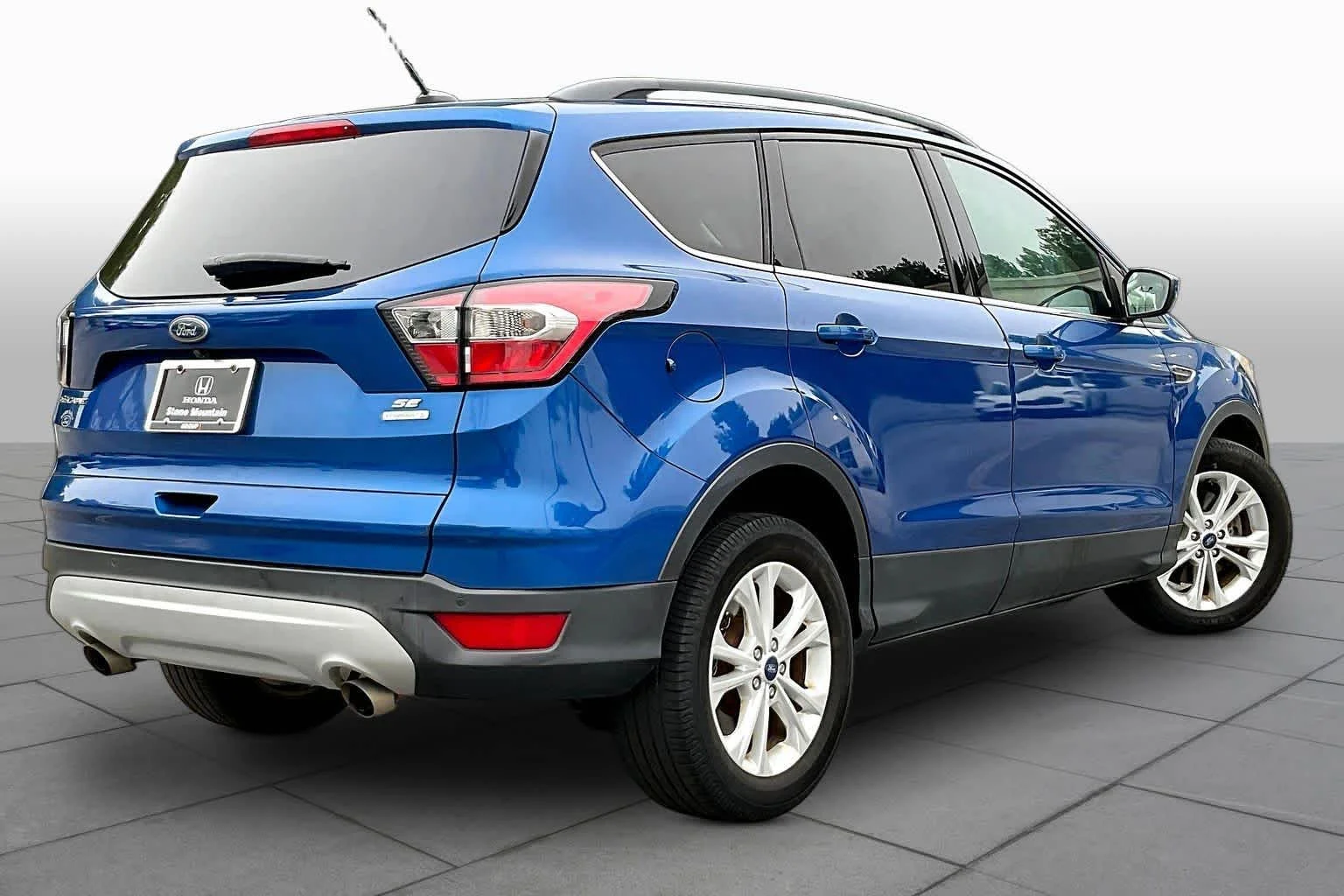 Used 2017 Lightning Blue Metallic Ford SE image 13