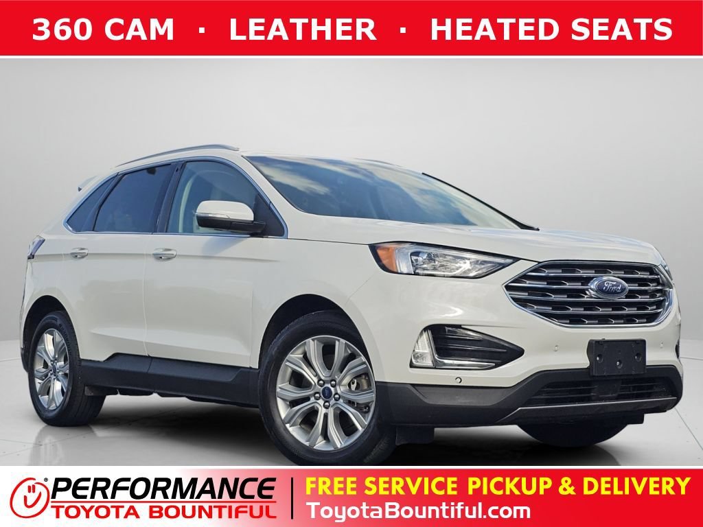 Used 2020 White Metallic Ford Titanium image 1