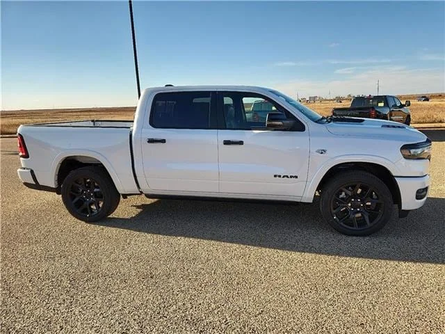 New 2026 PWD Ivory White Ram LARAMIE CREW CAB 4X4 5