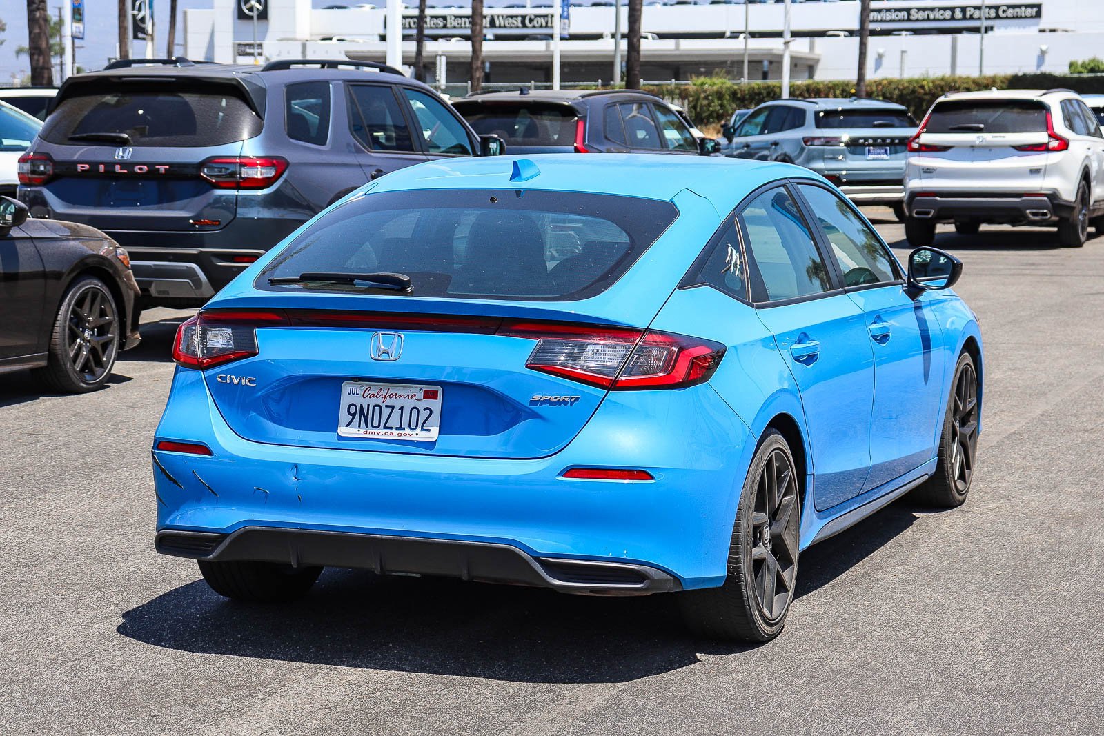 Certified Used 2024 Boost Blue Pearl Honda Sport image 11