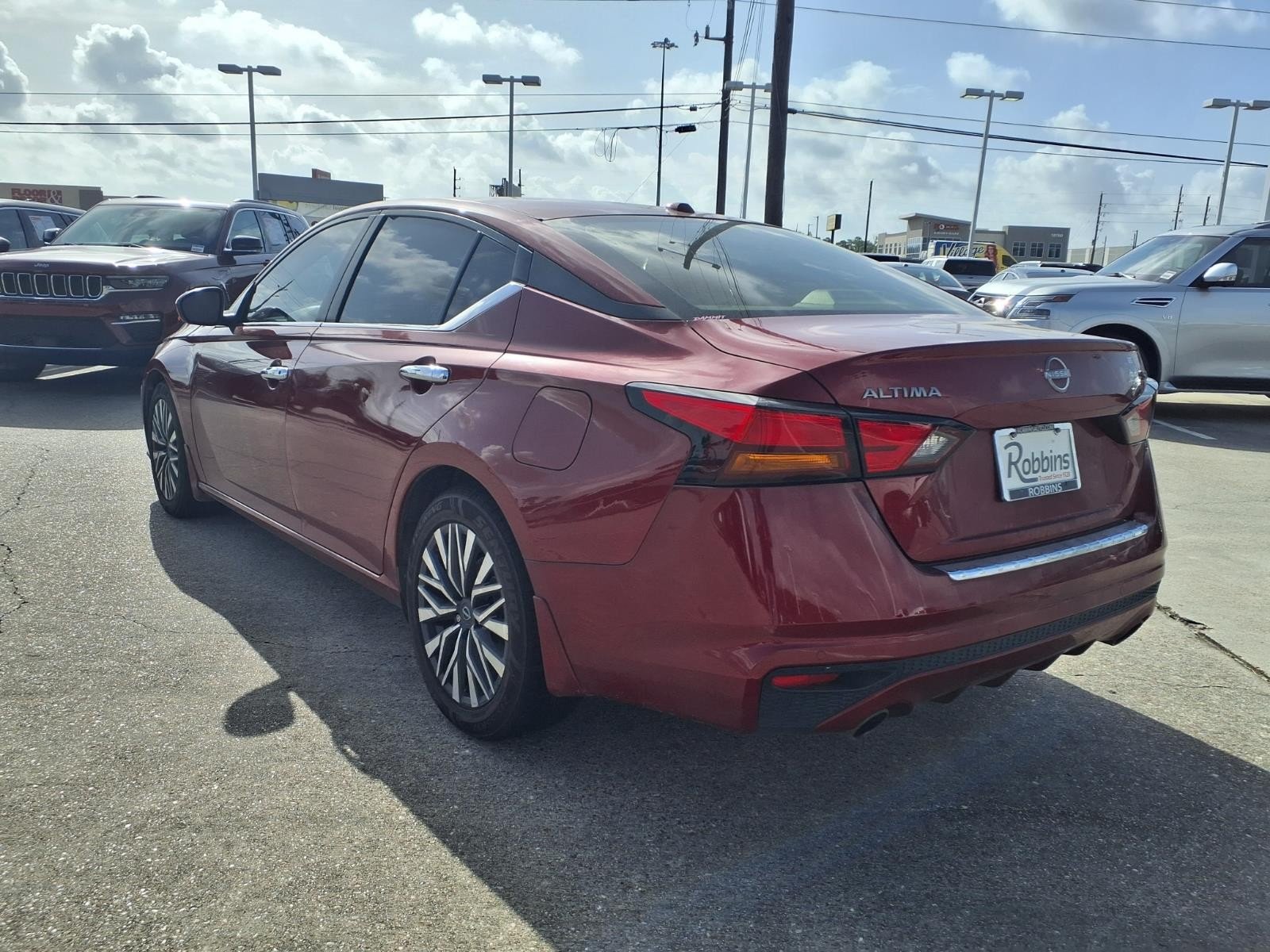 2023 Nissan Altima 2.5 SV Red at Robbins Nissan