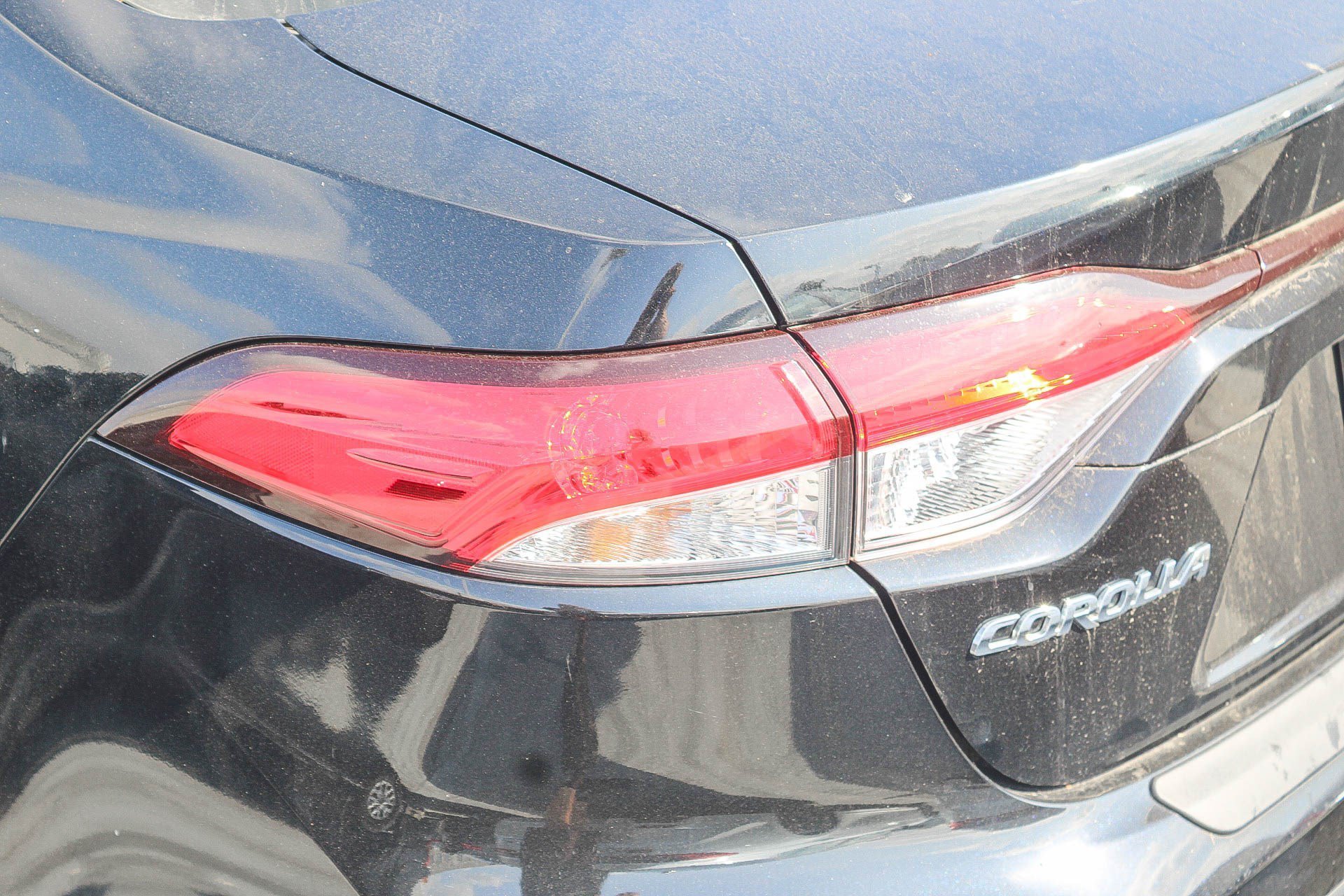 Used 2024 Midnight Black Metallic Toyota Hybrid LE image 10
