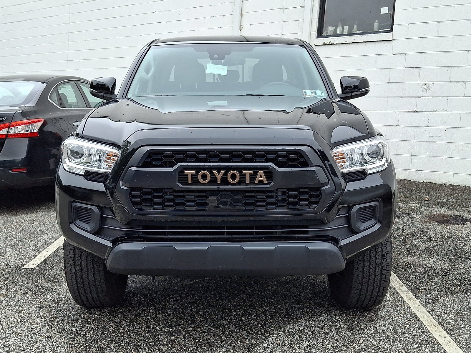 Used 2023 Black   202 Toyota Trail Edition image 1