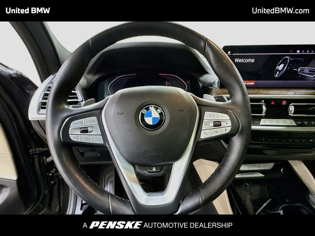 Used 2022 Dark Graphite Metallic BMW xDrive30i image 13