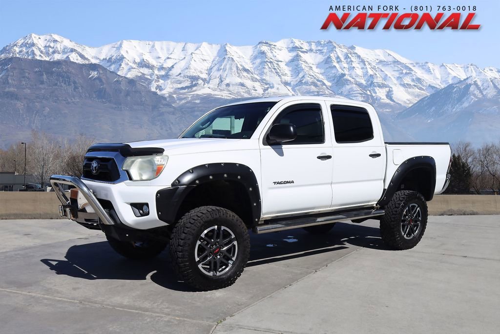Used 2014 Super White Toyota Base image 1