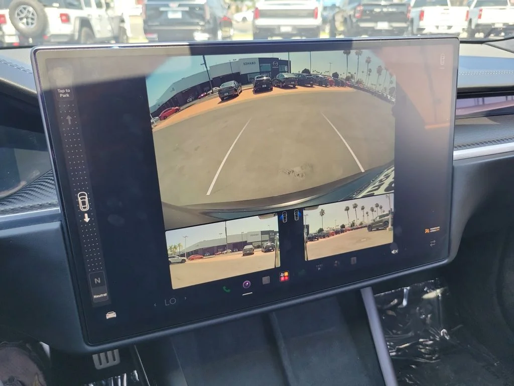 Used 2021 Solid Black Tesla Plaid image 9