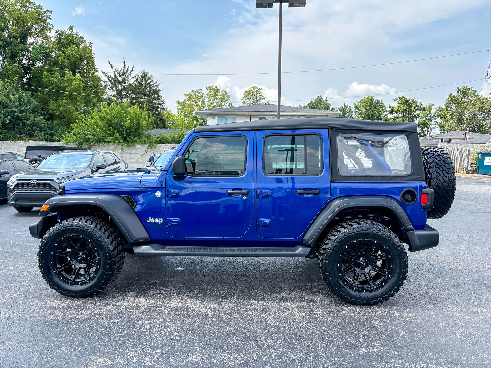 Used 2019 Blue Jeep Unlimited Sport image 7
